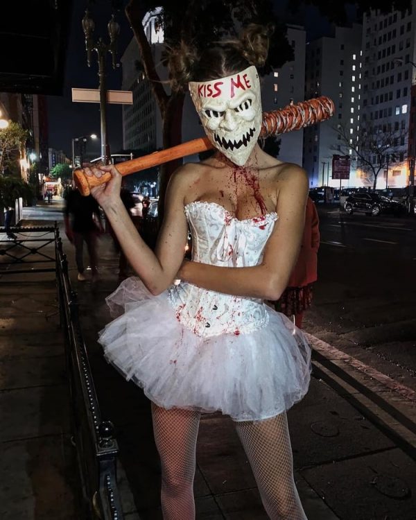 Kiss me purge mask girl in a costume