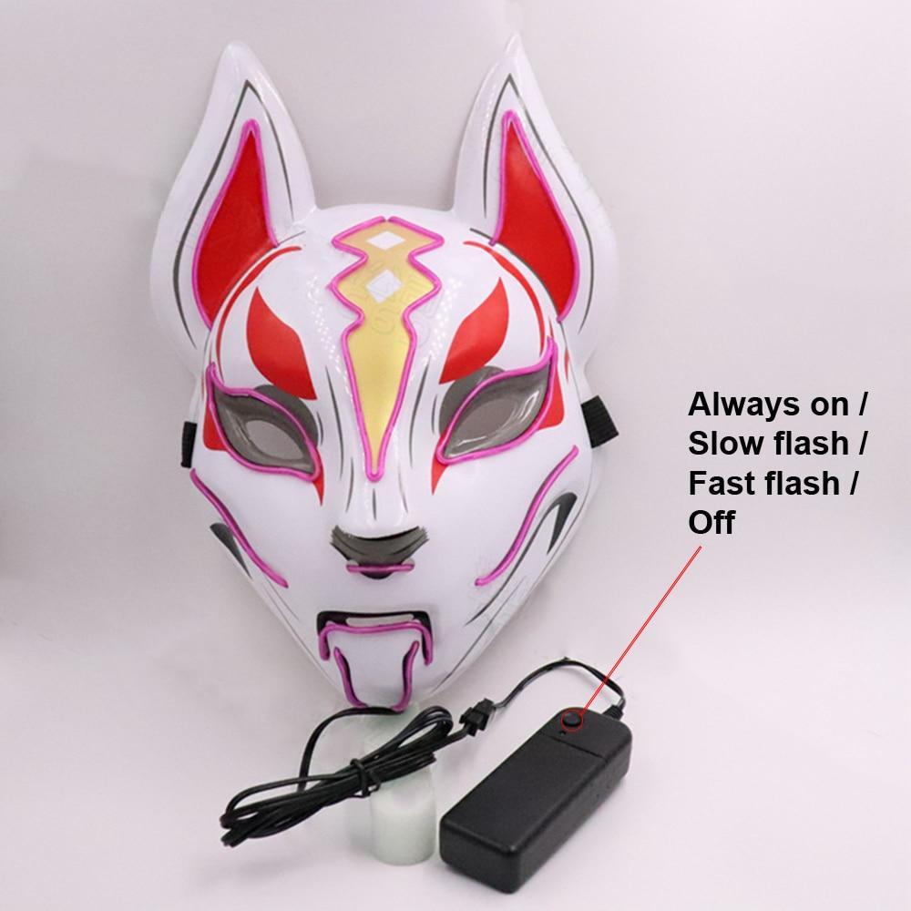 the remote controller of the pink kitsune mask