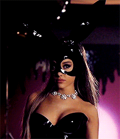woman with a latex black rabbit mask